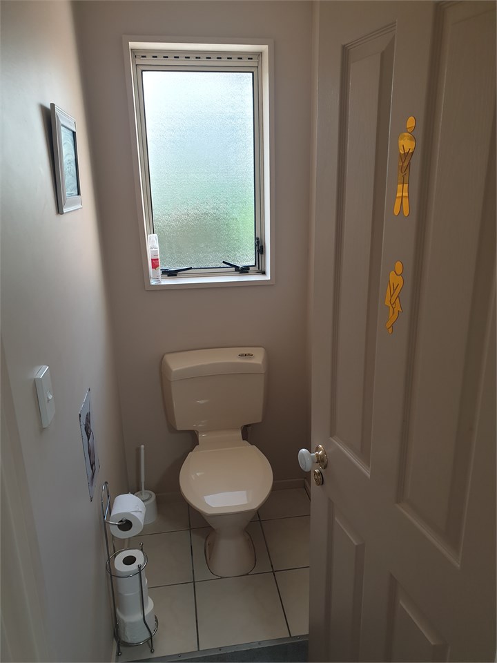 Main Toilet between main Bathroom and Laundry