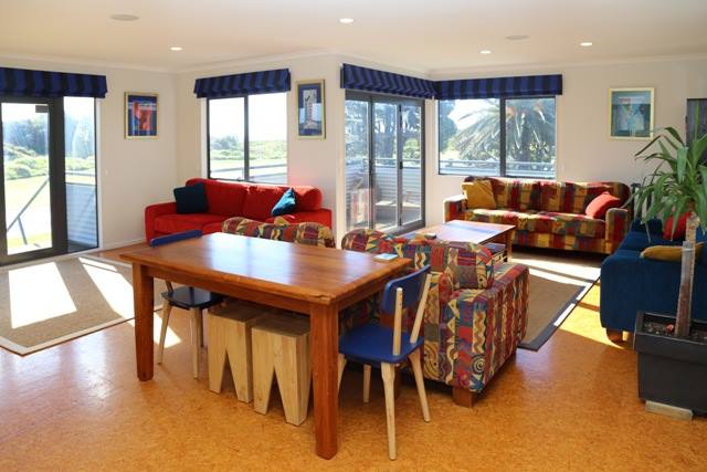 big open plan living area with deck access all aro