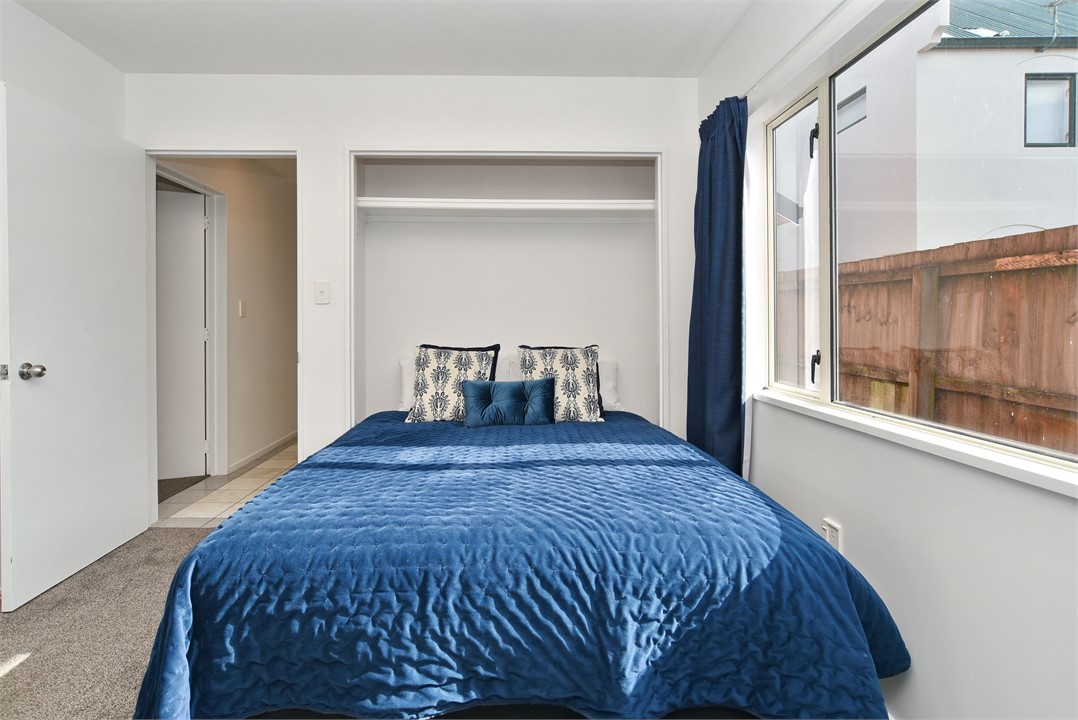 Bedroom 4, downstairs, comes with a Queen bed