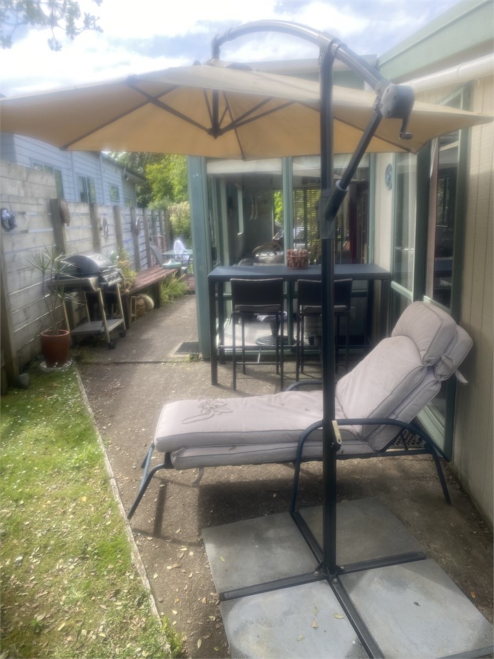 North side of cottage with outdoor furniture front