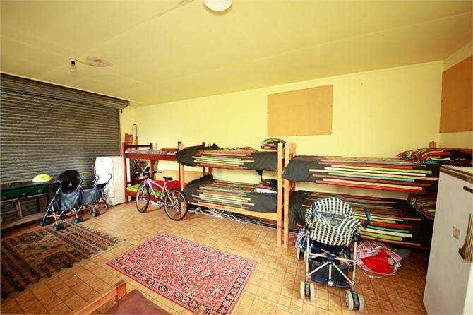 bunk house with toilet and shower