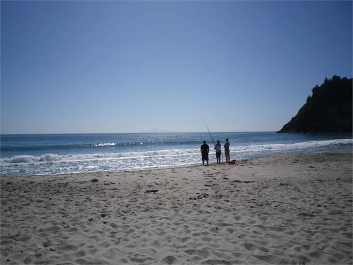 surfcasting off the beach