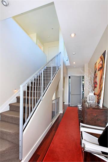 Hall and stairs to Masterbedroom