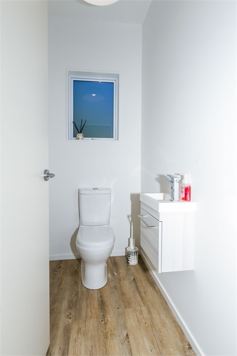 Separate toilet on mid-level (living area level)