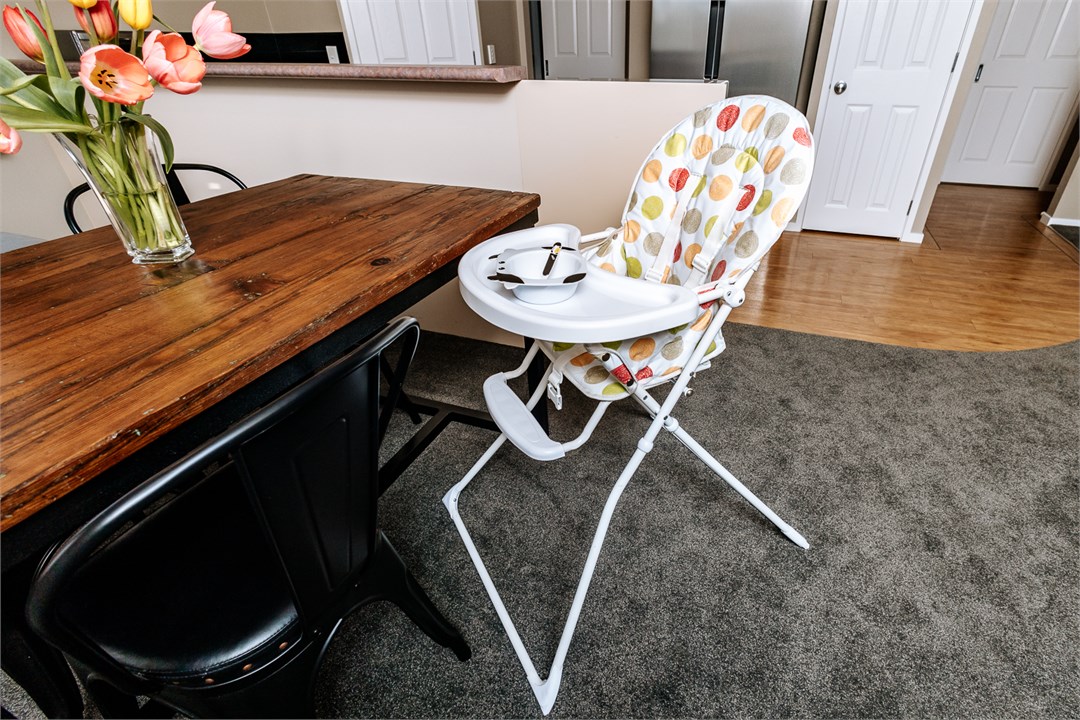 Highchair with a range of dishes & cutlery for the