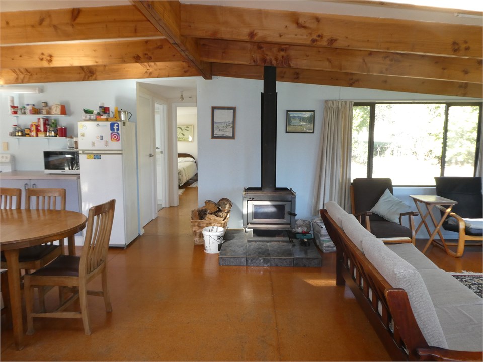 Open plan living, dining & kitchen with woodburner