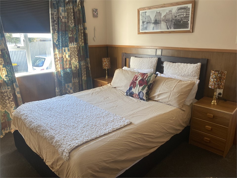 Master bedroom with queen bed