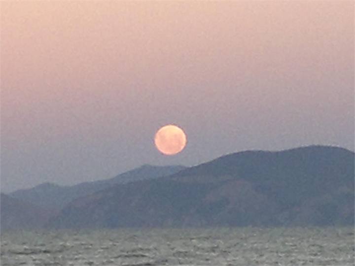Full moon rising from deck