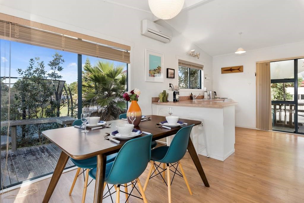 Extendable dining table seats up to 8 people.