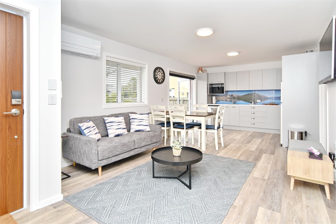 Living area with a TV and sitting areas