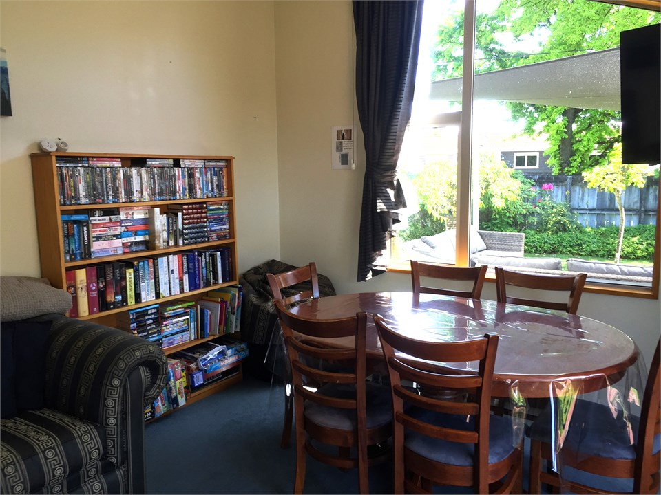 Book shelf with DVD's, books and games for all age