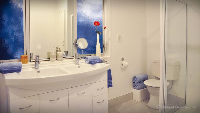 House Bathroom with double vanity, shower & toilet