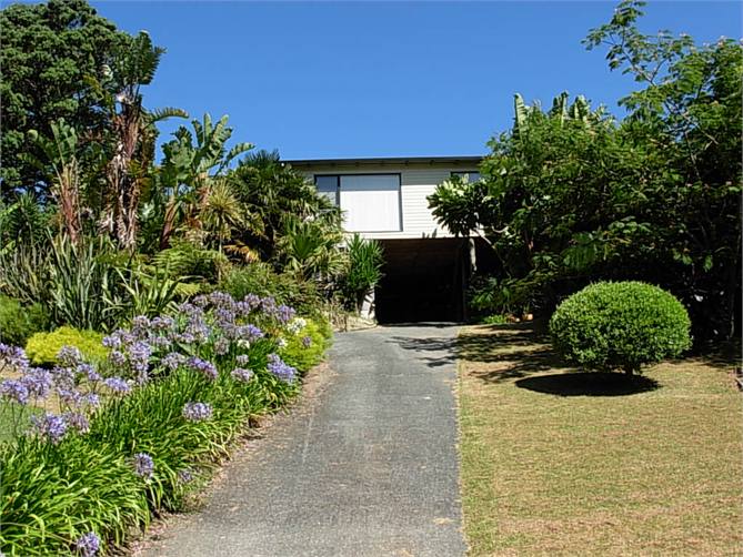 4 minutes and you are in the ocean, flat walk.