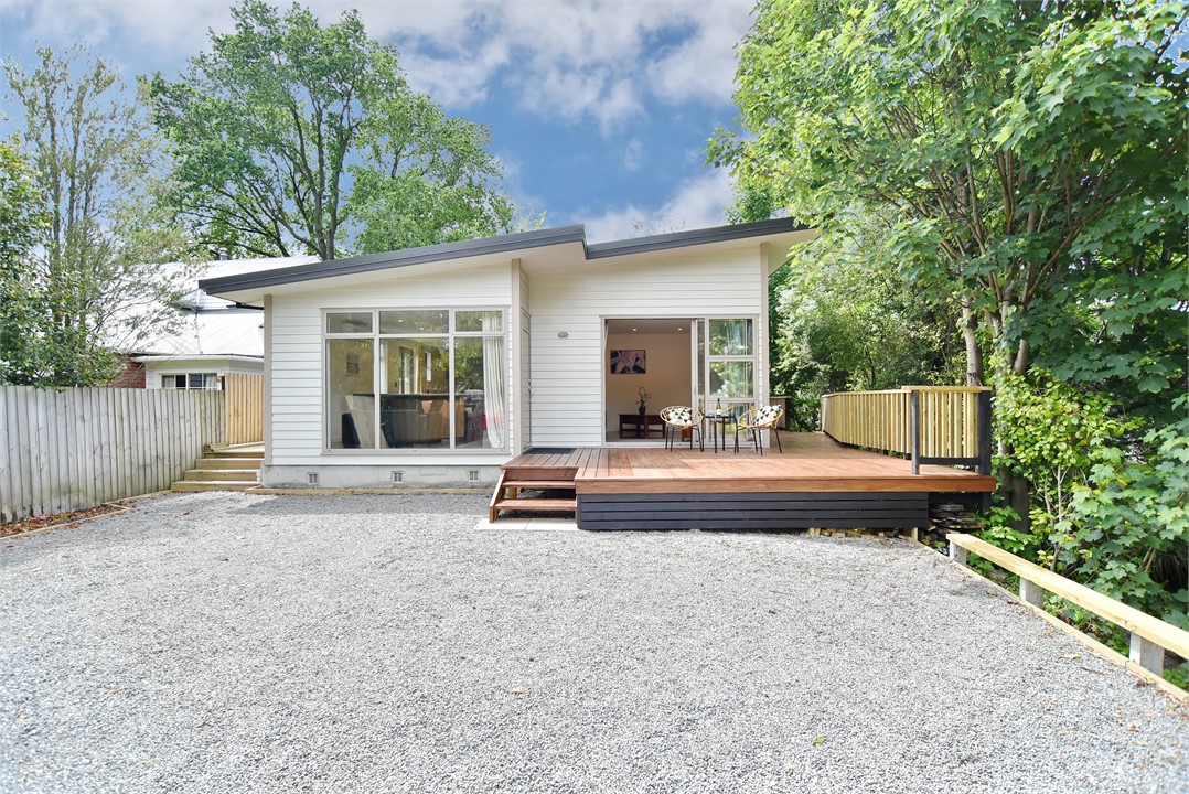 Exterior of the home from the entrance. To the rig