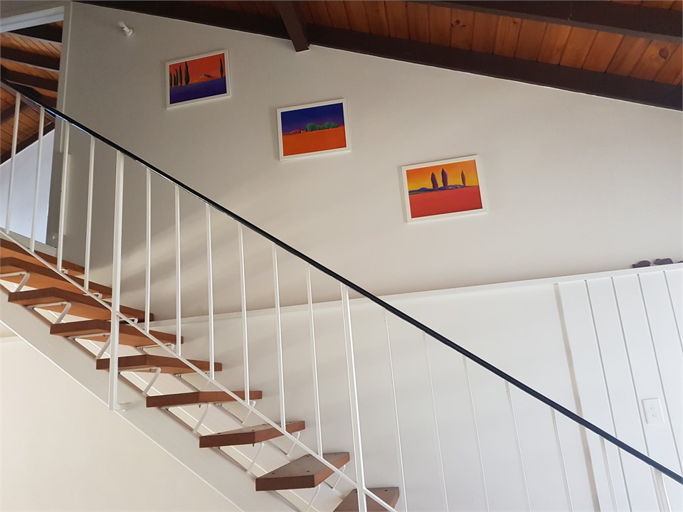 Stairway to 3 bedrooms upstairs