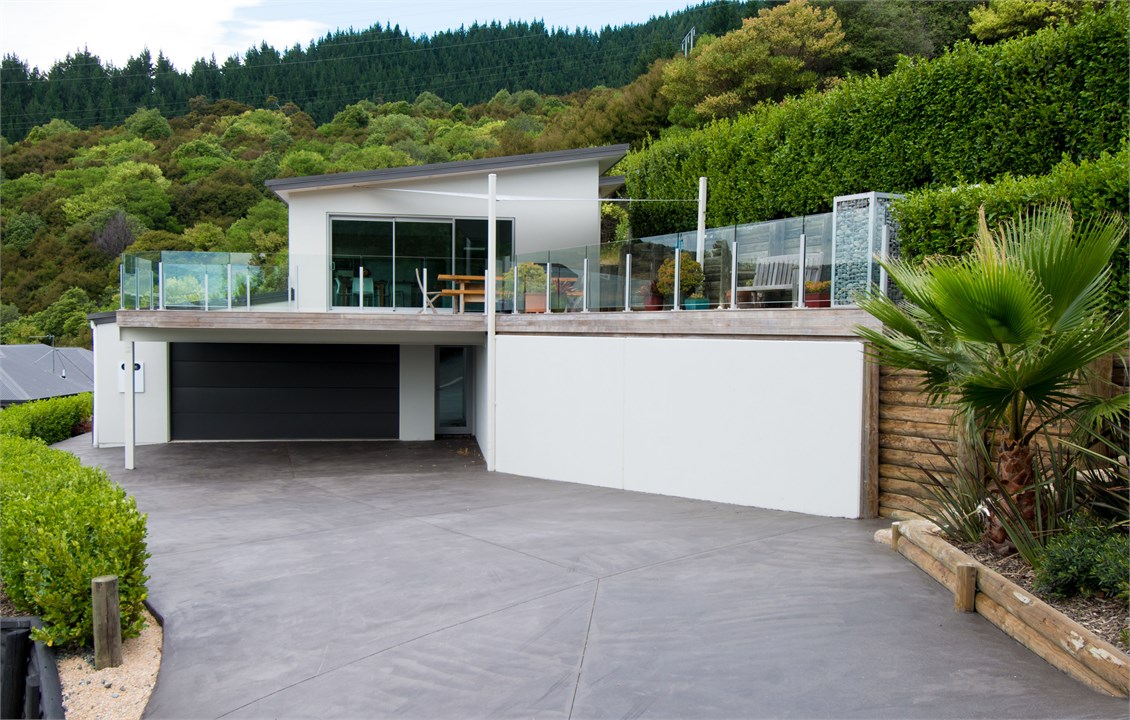 Exterior - completely built into NZ native bush!
