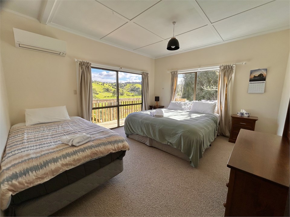 Bedroom 1 with access to wrap around deck