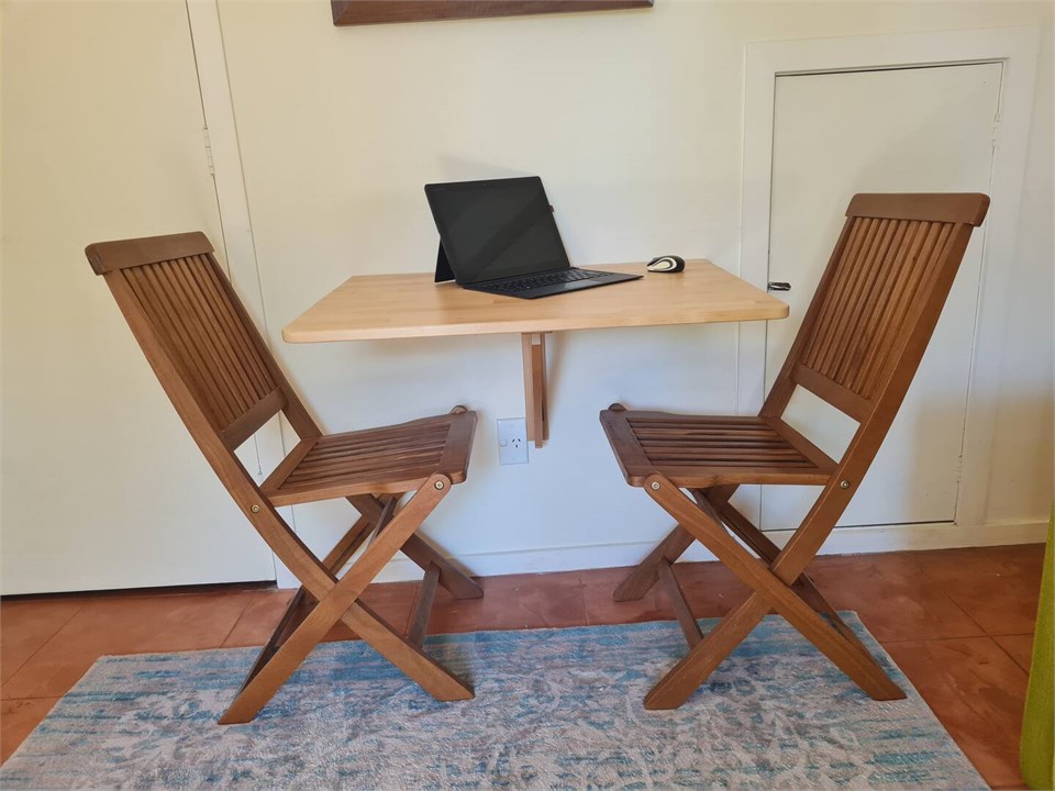 Compact workspace in lower living area