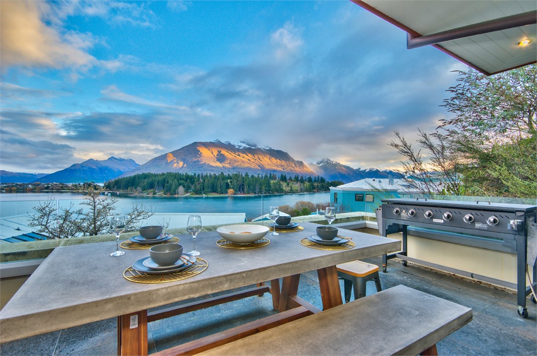 Sunset from balcony - outdoor table & BBQ