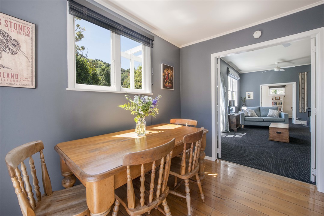 Dining area opening on lounge & study