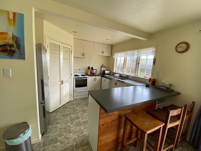 Kitchen with sea views, Access to outdoor patio ar