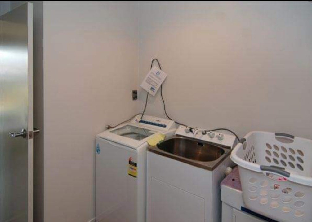 laundry downstairs in garage area