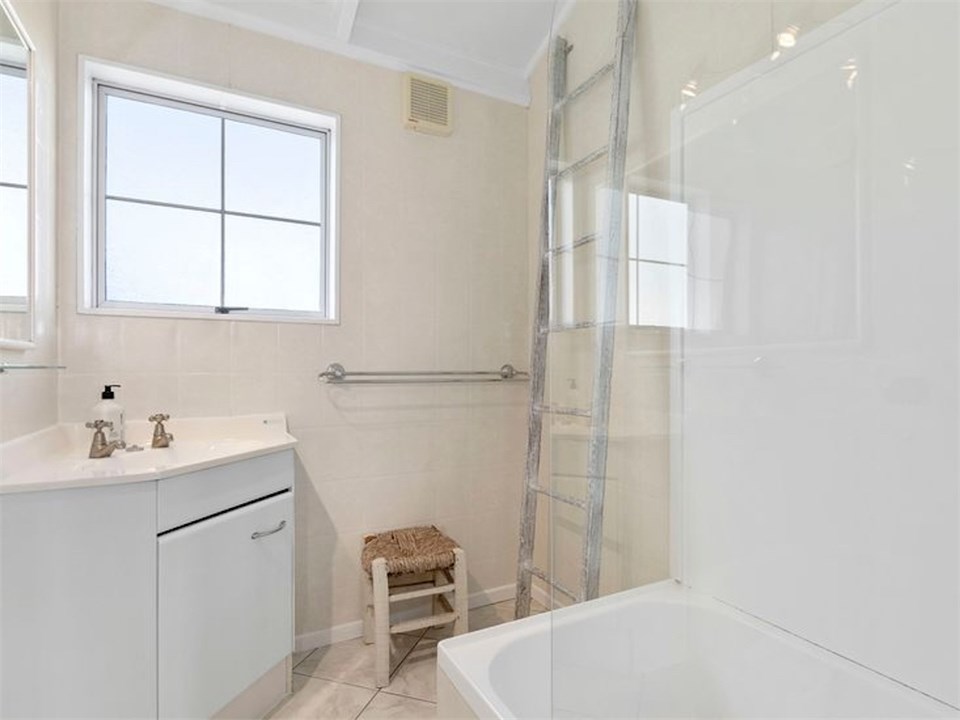 Bathroom, shower over tub and basin