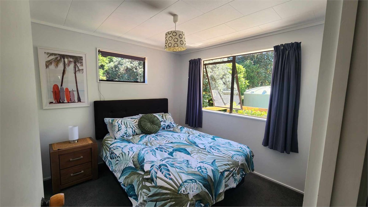 Queen size comfy bed in second bedroom.