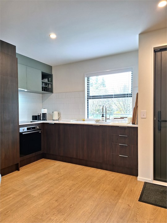 Well equipped kitchen with Nespresso coffee pod ma