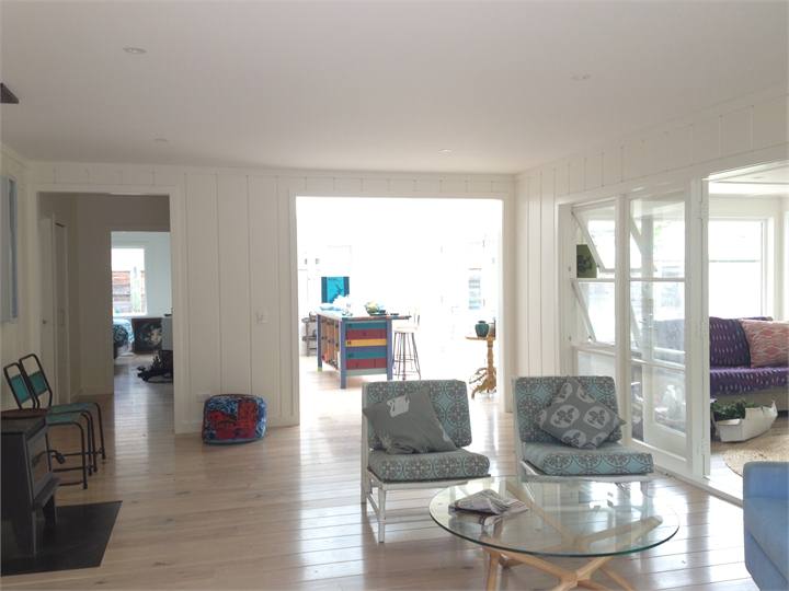 The living room, looking through to the kitchen