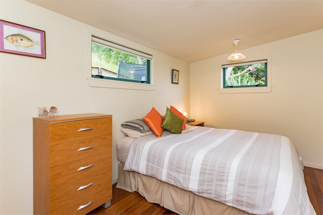 Queen sized bed in upstairs bedroom 2