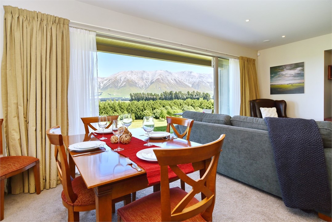 Dining area with living area in the background