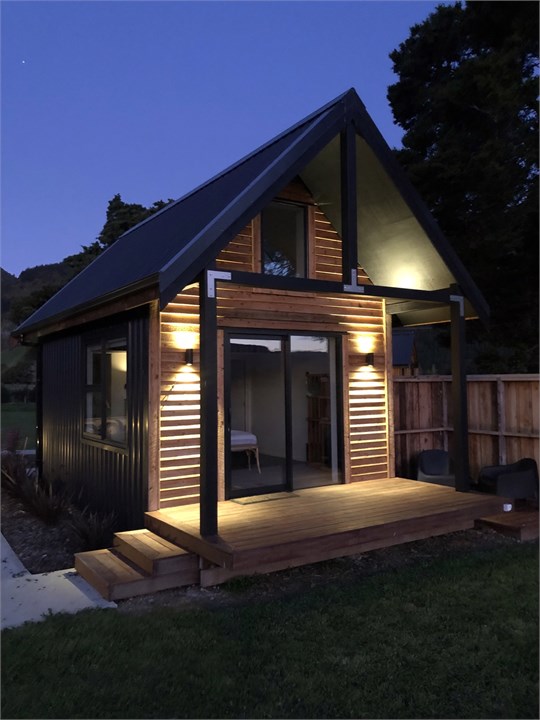 Exterior of hut at night