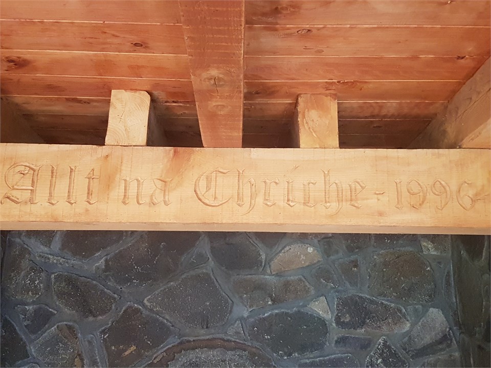 The name of the house carved in the beam above the