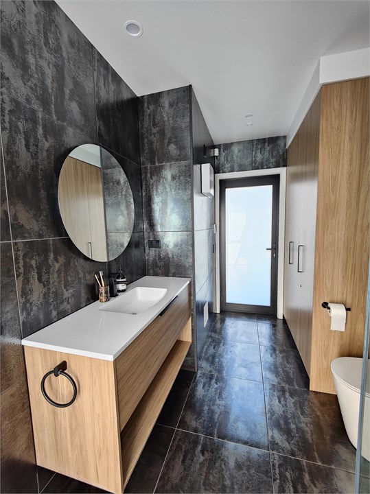 Enjoy a full sized, luxury tiled bathroom.