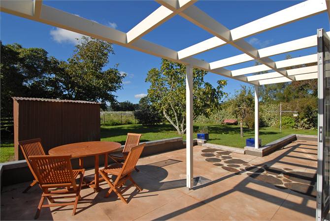 Patio with french doors to lounge
