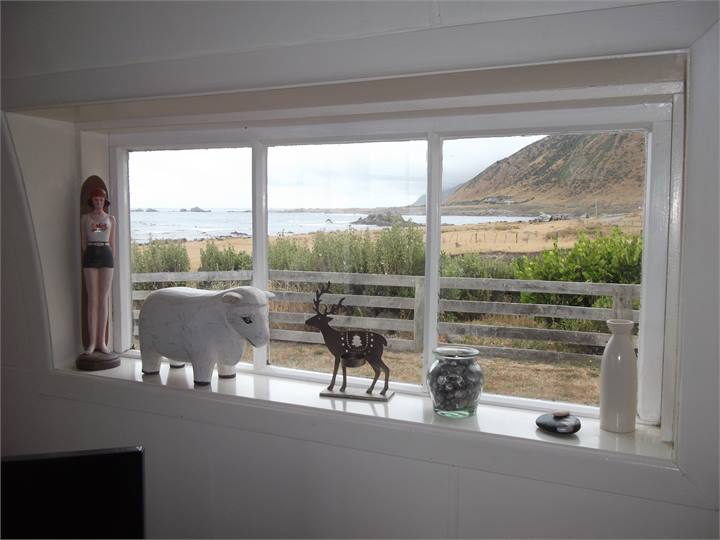 living room towards boats