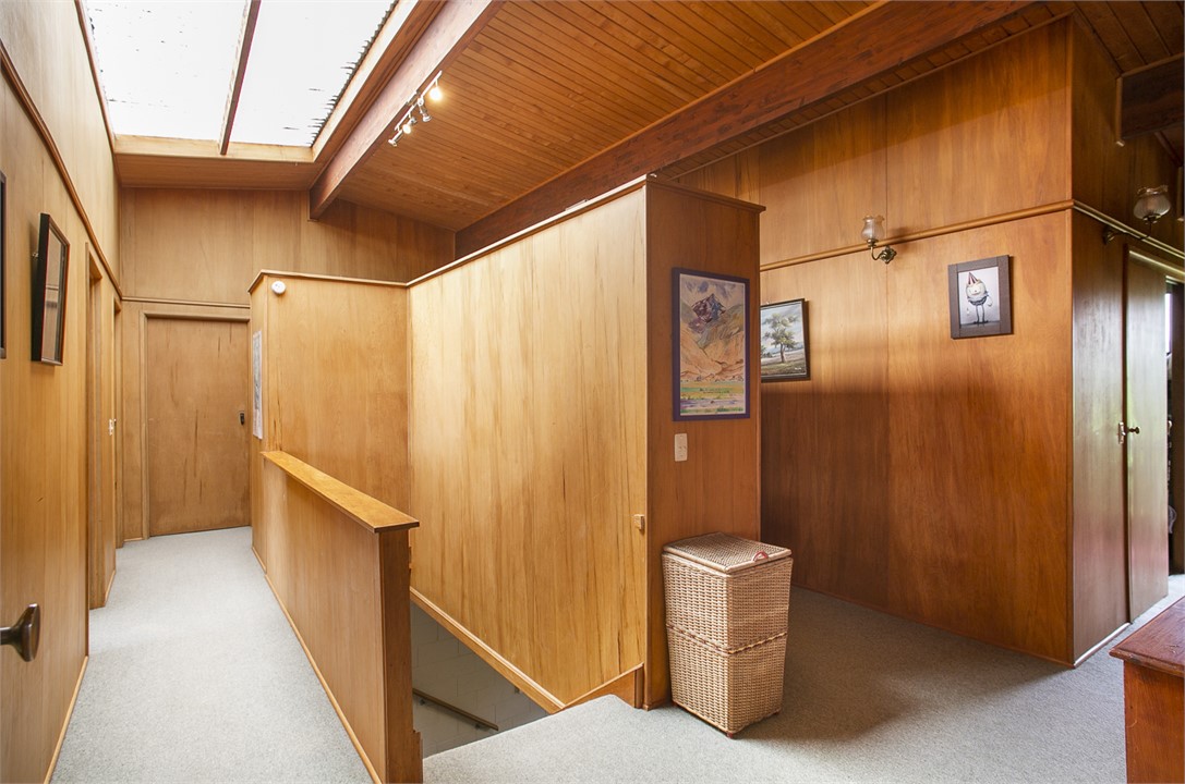 High stud and ply paneling throughout