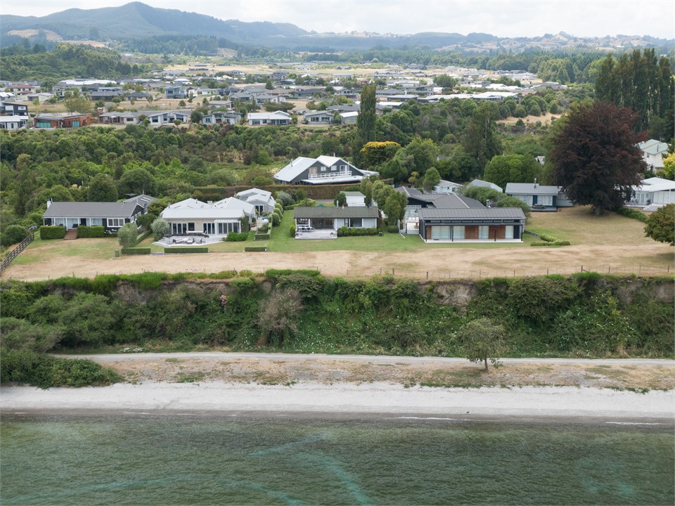 View from Lake (House in front of W roof)