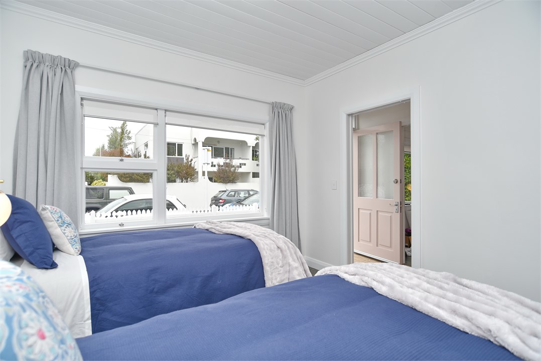 Bedroom 2 contains 2 Single beds