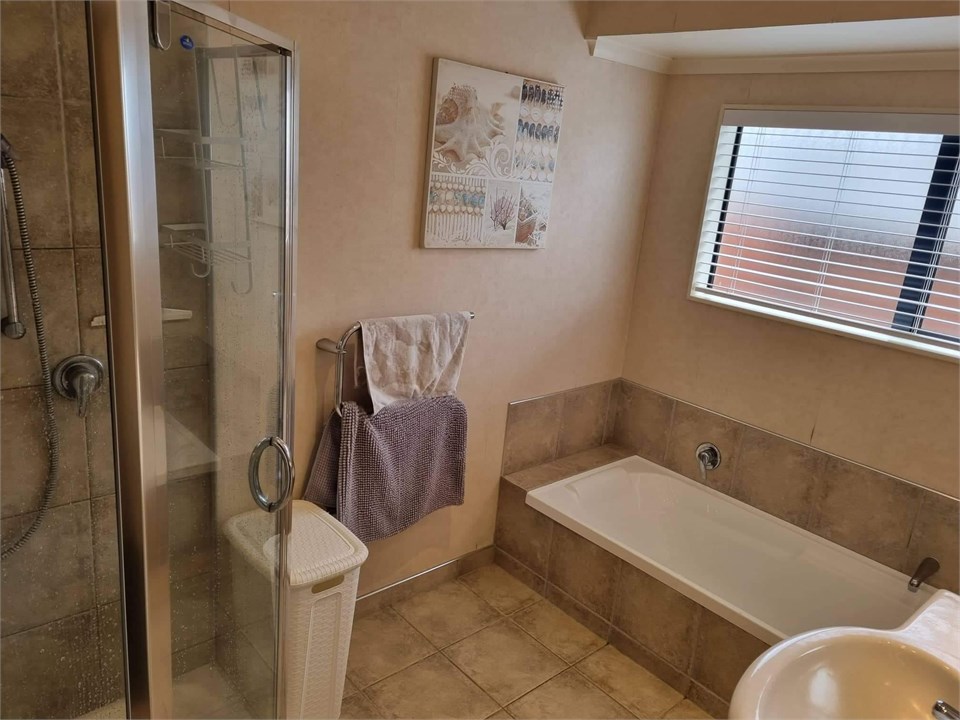 Main bathroom with shower and bath
