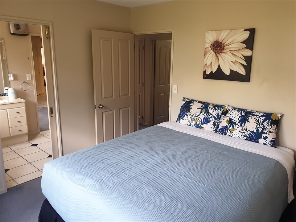 Bedroom 2: New King Bed. Access to main bathroom a