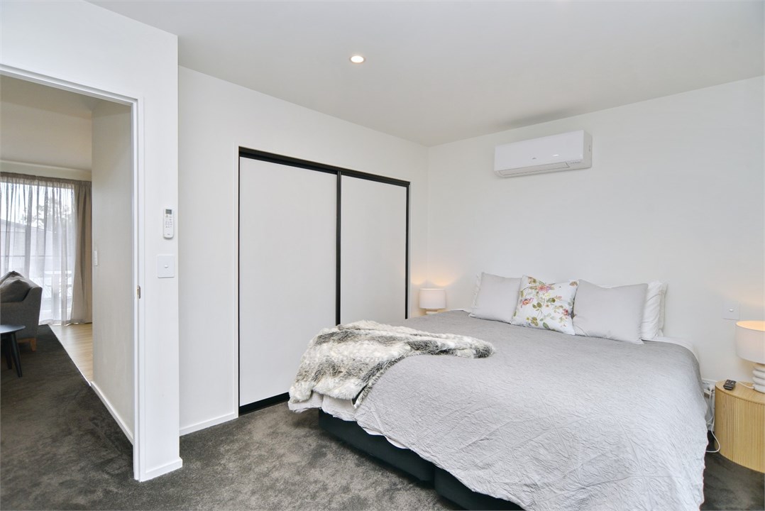 Bedroom 1 has a Super King bed and a TV