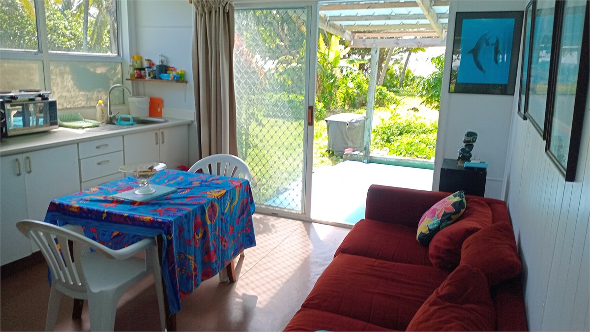 Looking from bedroom entrance through kitchen/livi