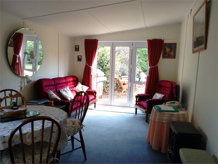 Loungeroom bi fold doors open to your private gard