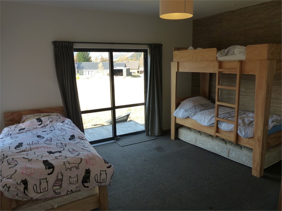 Bunkbeds and single bed with pull out trundler