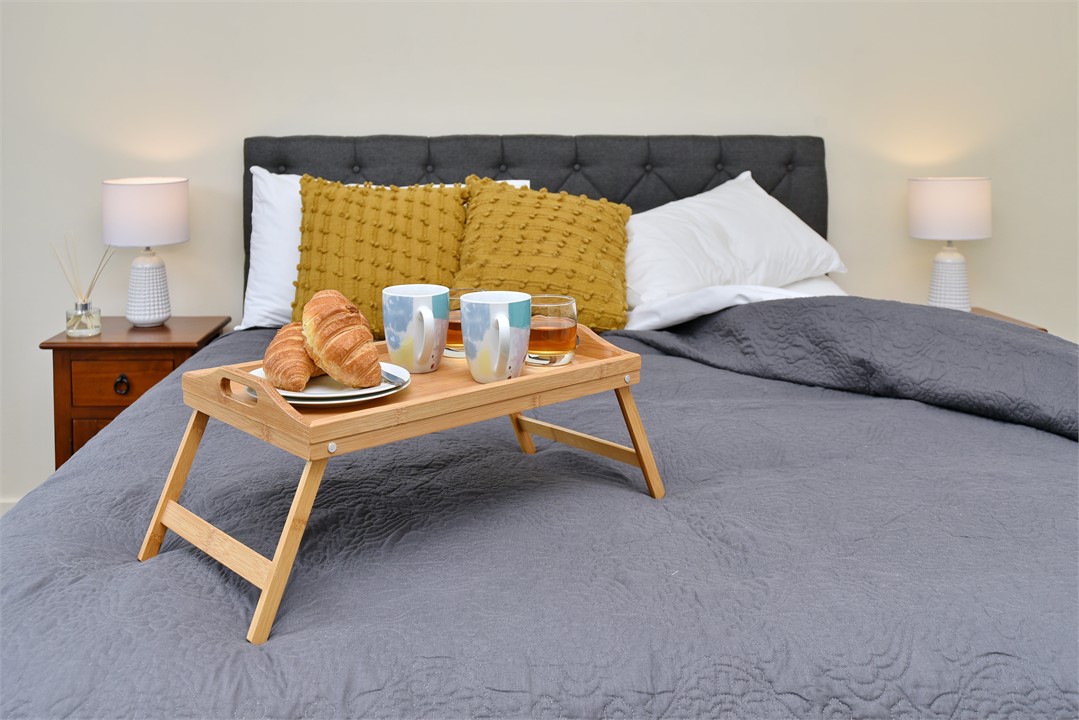 Bedroom 1 includes a luxury king-sized bed