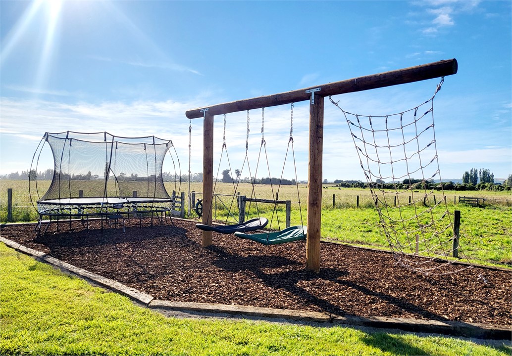 Playground with adult sized star gazing swings