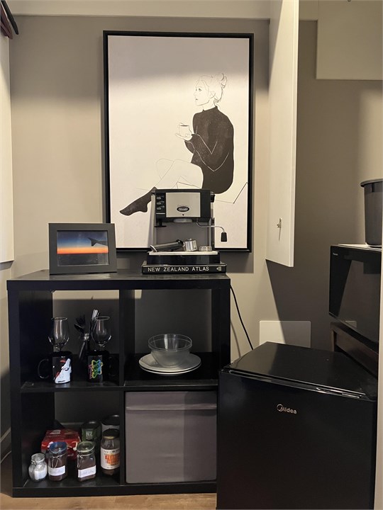 To your left on the way to the bathroom, a small k