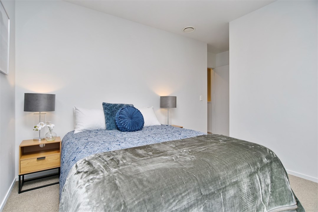 Bedroom 3 has a Queen bed